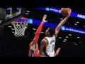 2 people playing basket ball