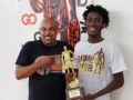 Eric Hicks holding trophy
