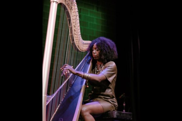 Brandee Younger, a harpist and the artistic curator for 2024