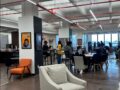Inside Ember High School's DUMBO campus students are sitting in library