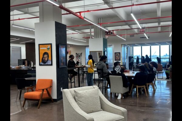 Inside Ember High School's DUMBO campus students are sitting in library