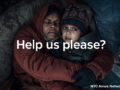 Women is hugging his child in winter