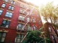 NYC apartment building photo credit: Shutterstock