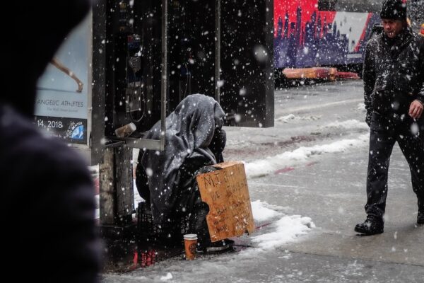 File photo A homeless iperson s seen during a snowstorm in the street in New York City. March, 22 2018. NYC Shuterstock by Miguel Pessoa